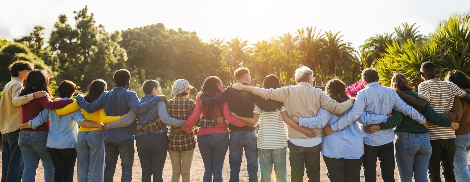 a group of people holding each other in a line
