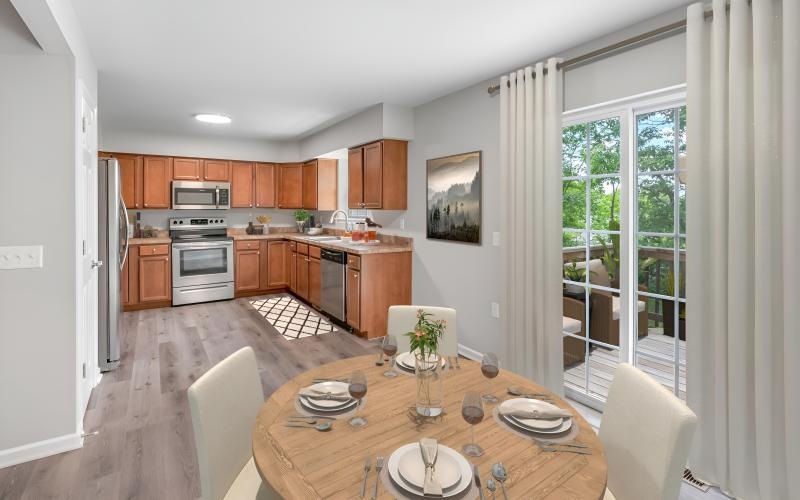 a kitchen with a dining table